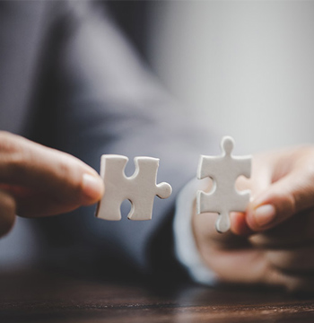 Two puzzle pieces that fit together are found